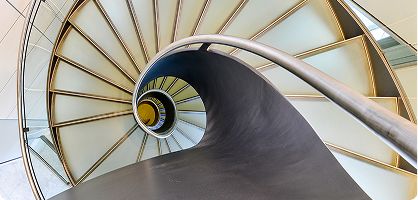 London – spiral staircase inside Cheyne Capital's London office